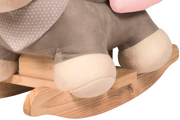 Plüschesel auf Holzsockel.